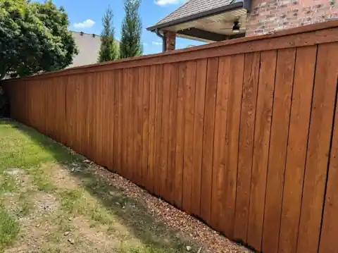 Western cedar privacy run stained in Dark Sierra